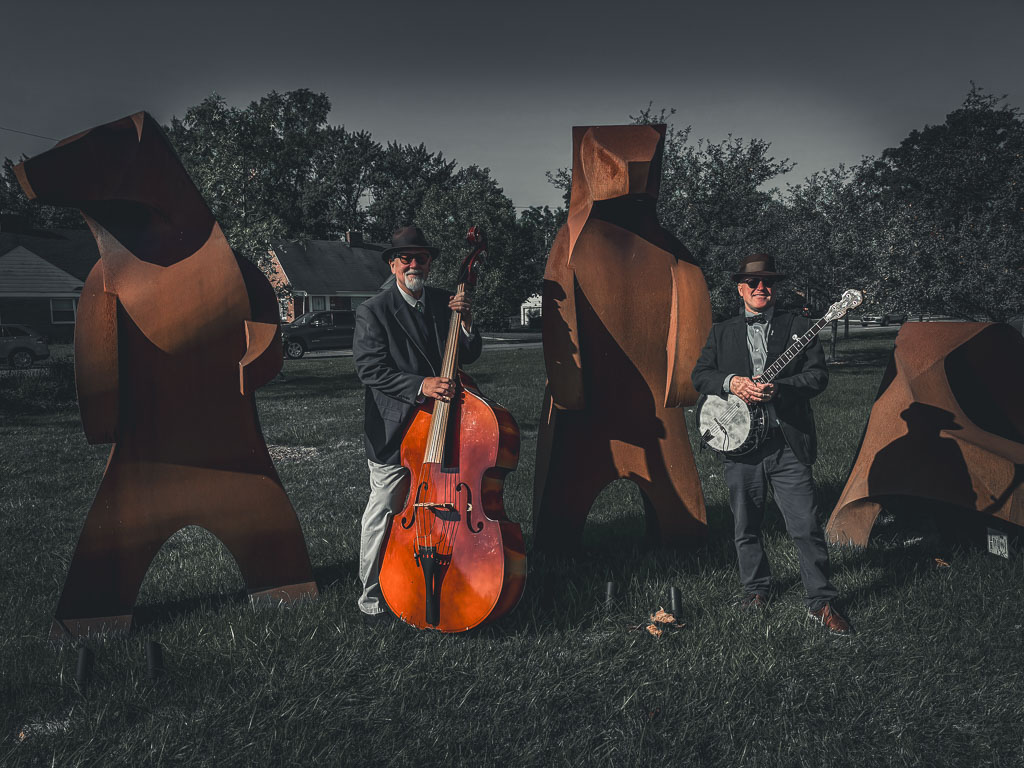 Acoustic Detroit cover band The Thrift Shop Cowboys performing folk and Americana music outdoors